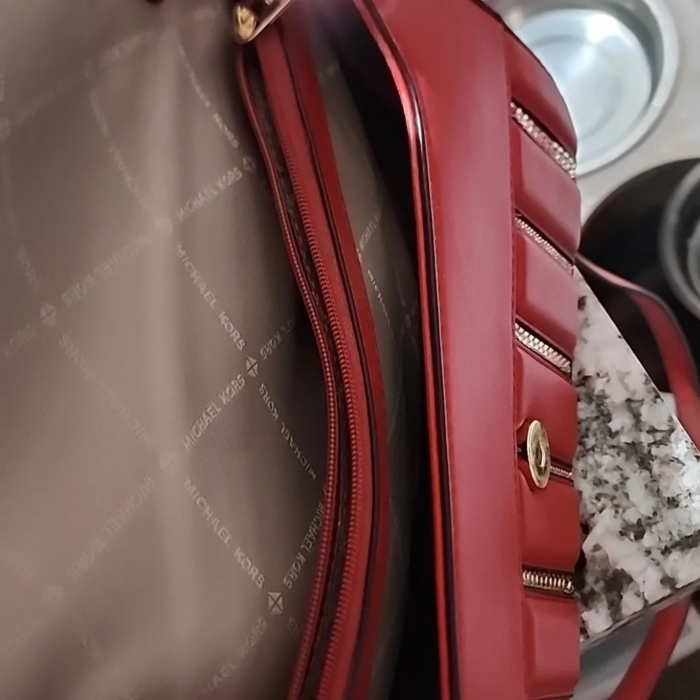 Gently used Michael Kors‎ red leather crossbody bag.
